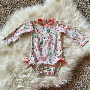 Ruffle Butts long sleeve swimsuit